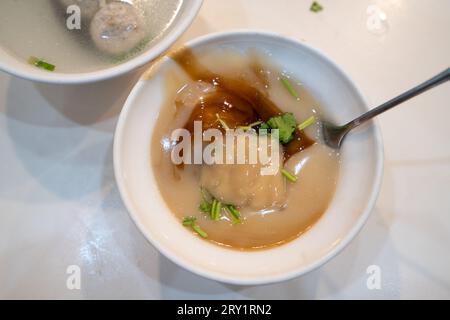 Taiwanese meatball - Delicious street food Bawan (Ba wan), steamed and deep fried starch wrapped round shaped dumpling with pork inside Stock Photo