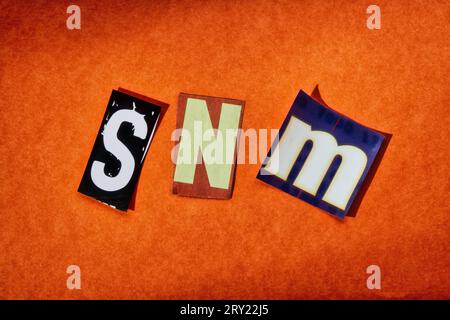 The acronym "SNM" slang using cut-out paper letters in the ransom note