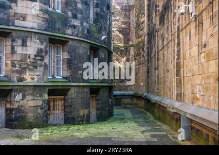 Inside the medieval walls of the old prison of Lancaster Castle, Lancashire, UK. The 'Female Felons' exercise yard Stock Photo