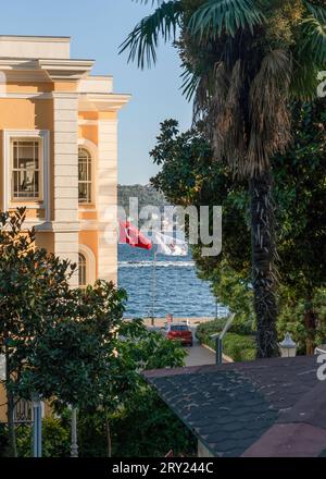 Istanbul, Turkey - September 16, 2023: Galatasaray University building at Ciragan street with flags waving Stock Photo