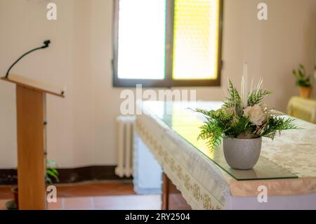 Altar of church with lectern and microphone for priest speeches with clear light Stock Photo