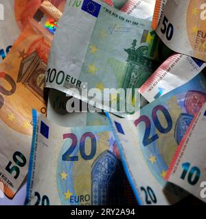 Scattered pile of euro notes of various denominations 10 euros,20 euros,50 euros,100 euros. Studio. September 2023 Stock Photo