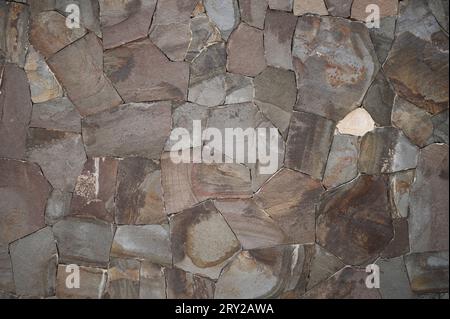 Rough damaged style stone wall background. Pattern of scratched cement texture Stock Photo