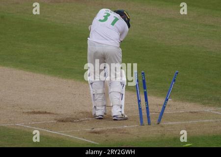 Chester le Street, 28 September 2023. Chris Wright batting for Leicestershire against Durham Cricket in the County Championship Division 2 game at Seat Unique Riverside is out bowled. Credit: Colin Edwards Stock Photo