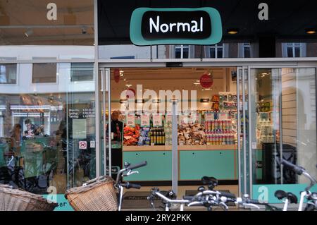 Copenhagen/Denmark/28 September 2023/.People pass by Normal store in danish capital. Photo.Francis Joseph Dean/Dean Pictures Stock Photo