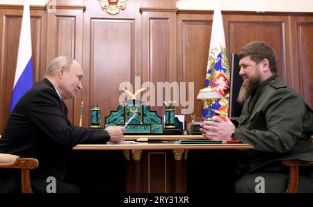 Moscow, Russia. 28th Sep, 2023. Russian President Vladimir Putin, left, listens to Chechen leader Ramzan Kadyrov, right, during a face-to-face working meeting at the Kremlin, September 28, 2023 in Moscow, Russia. Credit: Mikhail Metzel/Kremlin Pool/Alamy Live News Stock Photo