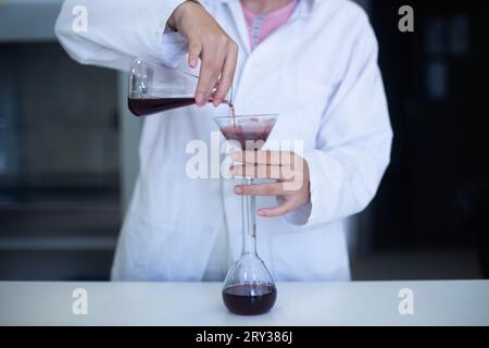 using laboratory filter paper at the bioengineering, biology and chemical laboratory Stock Photo