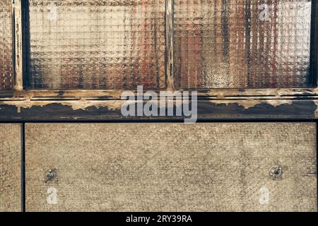 Joints in the wall between wooden boards. Background texture. Textured MDF sheet, abstract background. Texture of the reverse side of the fiberboard sheet. High quality photo Stock Photo