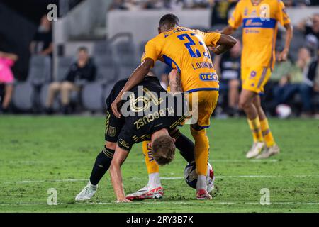 LAFC midfielder Mateusz Bogusz (19) and Tigres UANL forward Luis Quiñones (23) battle for possession during the Campeones Cup 2023 final, Wednesday, S Stock Photo