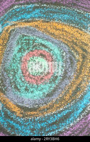 Drawing with chalk on pavement. Colored circles. Bright background. Drawing with colored crayons. Stock Photo