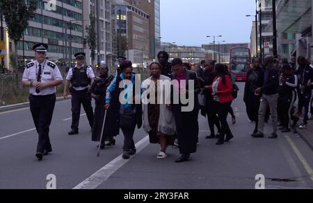 A church leader on behalf of the family arrives to read out a statement near the scene in Croydon, south London, where 15-year-old Elianne Andam was stabbed to death on Wednesday morning. Picture date: Thursday September 28, 2023. Stock Photo