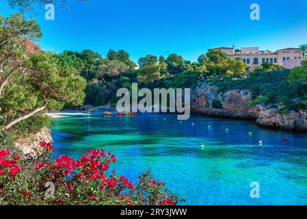 Beautiful bay of water scene near Cala Ferrera beach in the summertime in Mallorca Balearic Islands, Spain Stock Photo