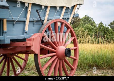 replica of pioneer covered wagon on a prairie in Scotts Bluff National Monument, Nebraska Stock Photo