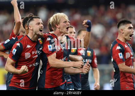 Morten Thorsby of Genoa celebrates with his team-mates after