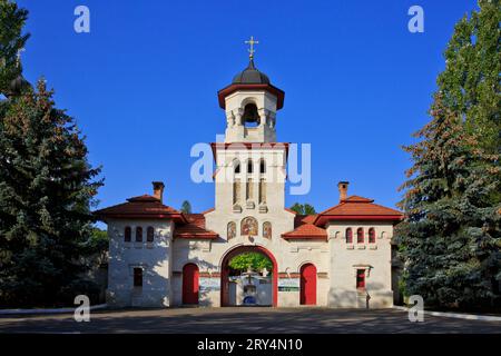 The main entrance (gatehouse) to Curchi Monastery (founded in 1773-1775) in Curchi (Vatici), Moldova Stock Photo