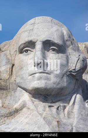 Mount Rushmore National Memorial is a colossal sculpture carved into the granite face of Mount Rushmore. George Washington, Thomas Jefferson, Theodore Stock Photo
