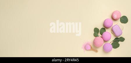Many different bath bombs on beige background, flat lay. Space for text Stock Photo