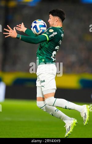 Piquerez of Palmeiras drives the ball the ball during a match