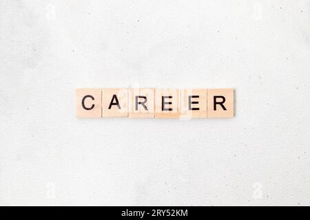 Top view of Career word on wooden cube letter block on white background. Business concept Stock Photo
