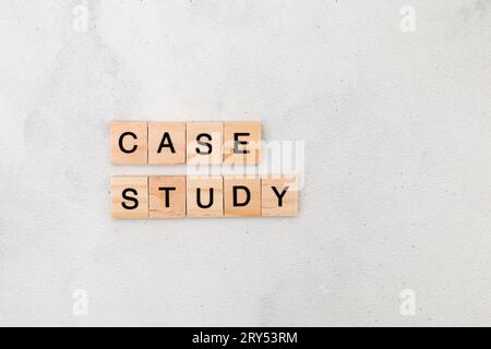 Top view of Case Study word on wooden cube letter block on white background. Business concept Stock Photo