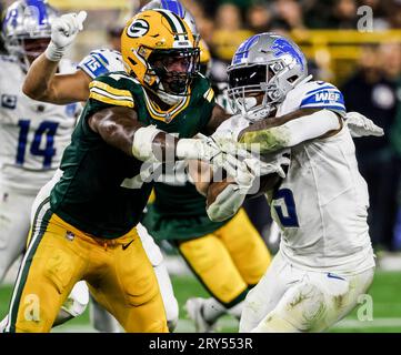 Green Bay Packers linebacker Quay Walker (7) heads to the end zone for a  touchdown after he intercepted a pass by Chicago Bears quarterback Justin  Fields during the second half of an