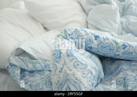 Bed with messy pick color Blankets, Stock Photo