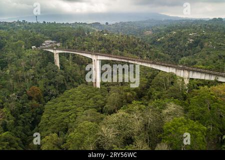 Aerial drone photograph of Tukad Bangkung bridge in Bali, Indonesia Stock Photo