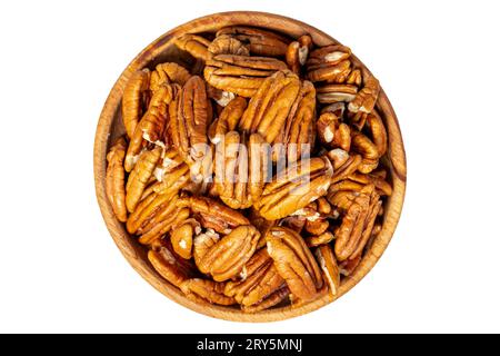 Pecan nut in wood bowl. Pecan nut isolated on white background. Top view Stock Photo