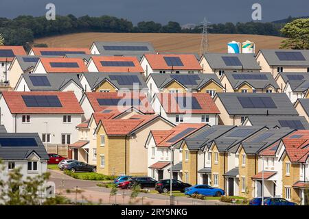 A new housing development in Inverkeithing with the houses fitted with solar panels. Stock Photo