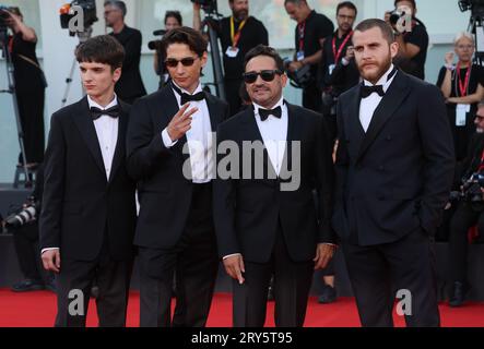 VENICE, ITALY - SEPTEMBER 09:  Agustín Pardella, Juan Antonio Bayona, Enzo Vogrincic and Matias Recalt attends a red carpet at 80th Venice Film Festiv Stock Photo