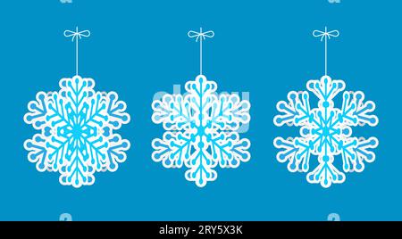 Set of hanging winter origami toy snowflakes. Six pointed fluffy cut out snowflakes of holiday garland decoration. Paper vector on blue background Stock Vector