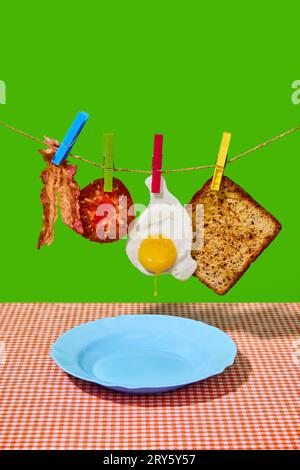 Ingredients. Fried egg, bacon, tomato and sandwich hanging over plate on green background. Breakfast. Pop art Stock Photo