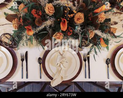 Stylish autumn table setting, ideal for Thanksgiving and large g Stock Photo