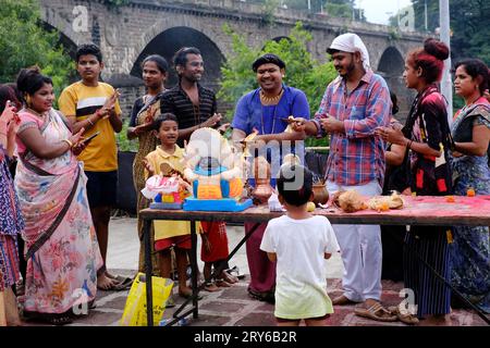 Pune, India - September 29, 2023, Water pollution in Pune is reduced by holding the ganpati visarjan in small water tanks. Sangam, Pune Stock Photo