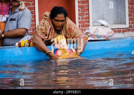 Pune, India - September 29, 2023, Water pollution in Pune is reduced by holding the ganpati visarjan in small water tanks. Sangam, Pune Stock Photo