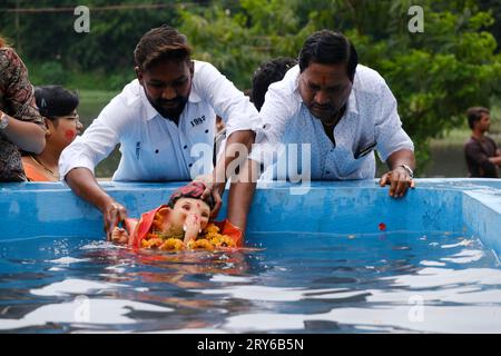 Pune, India - September 29, 2023, Water pollution in Pune is reduced by holding the ganpati visarjan in small water tanks. Sangam, Pune Stock Photo