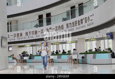 (230929) -- SHANGHAI, Sept. 29, 2023 (Xinhua) -- This photo taken on Aug. 20, 2019 shows an interior view of an administrative service center at the Lingang area of the China (Shanghai) Pilot Free Trade Zone in east China's Shanghai. (Xinhua/Fang Zhe) Stock Photo
