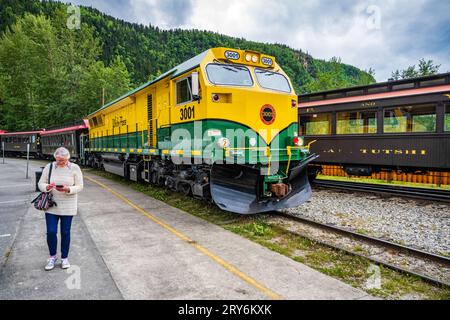 White Pass & Yukon Route locomotive 3001 (2020) prepares to haul a tourist train, departing the docks at Skagway, Alaska. Stock Photo