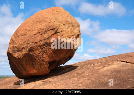 The balancing boulder at Beringbooding Rock, a large granite outcrop in the Wheatbelt region of Western Australia. Stock Photo