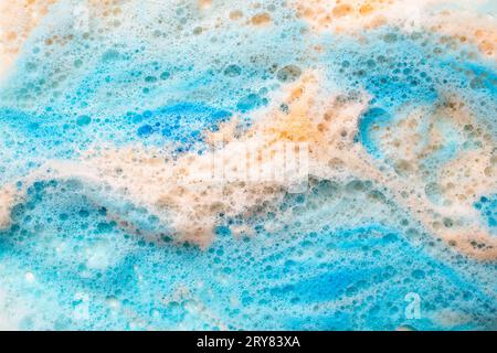 Turquoise and beige foam with bubbles, abstract soft focus close up texture Stock Photo