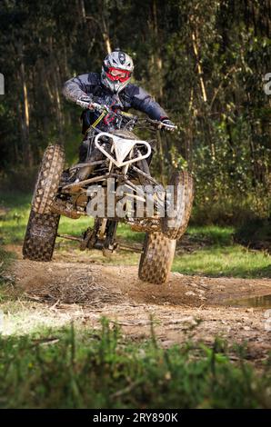 Quad rider jumping Stock Photo