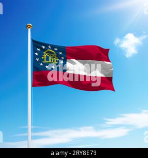 Waving flag of Georgia is a state of United States on flagpole with sky background. Stock Photo