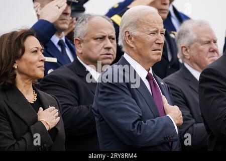 United States Vice President Kamala Harris and US President Joe Biden listen during a ceremony at the Armed Forces Farewell Tribute in honor of General Mark A. Milley, 20th Chairman of the Joint Chiefs of Staff, and participates in an Armed Forces Hail in honor of General Charles Q. Brown, Jr., the 21st Chairman of the Joint Chiefs of Staff at Joint Base Myer-Henderson Hall, Arlington, Virginia on Sept. 29, 2023. Credit: Nathan Howard/Pool via CNP /MediaPunch Stock Photo