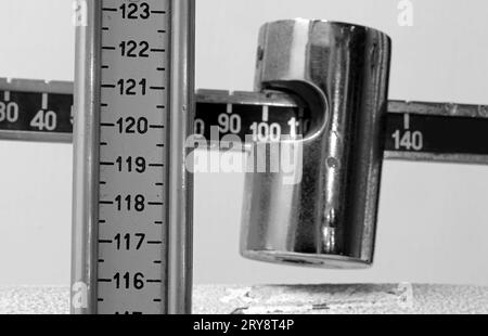 https://l450v.alamy.com/450v/2ry8t4p/patients-weight-and-height-numbers-during-medical-examination-on-a-vintage-metal-bathroom-scale-2ry8t4p.jpg