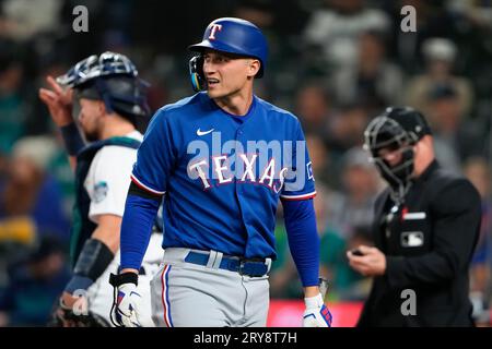 Texas Rangers' Corey Seager looks on after striking out during the first  inning of a baseball game against the Seattle Mariners, Thursday, Sept. 28,  2023, in Seattle. (AP Photo/Lindsey Wasson Stock Photo 