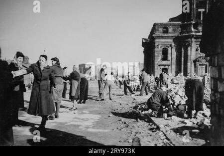 School mission to clear the Old Town of Dresden, which lay in ruins after the bombings in February 1945. Here, the Dresden Altmarkt in front of the Stock Photo