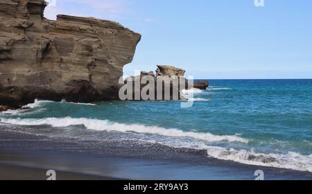 Partial view of the Papakolea green sand beach in Hawaii, on the big island.. Stock Photo