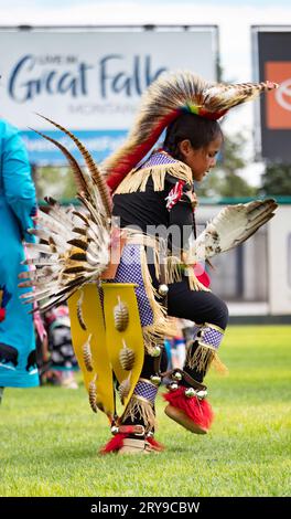 Young Boy Fancy Dancing at the Little Shell Chippewa Pow Wow in Great Falls, Montana Stock Photo