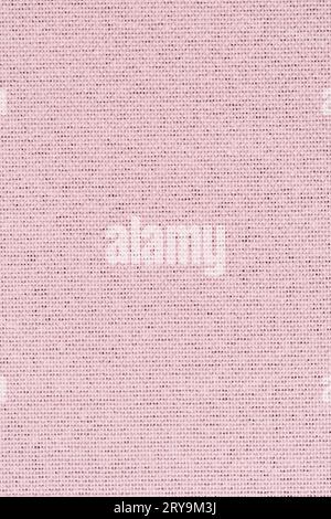A close-up of pink plastic with a bumpy texture. The texture is ...
