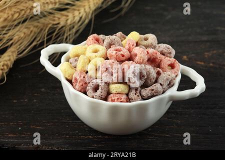 White Bowl with Colorful Ring Cereal for Breakfast Stock Photo